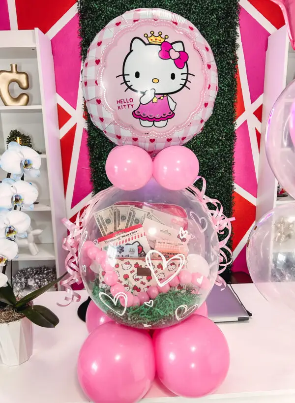 Hello Kitty themed stuffed balloon gift with clear balloon, mini balloons, and Hello Kitty accents.