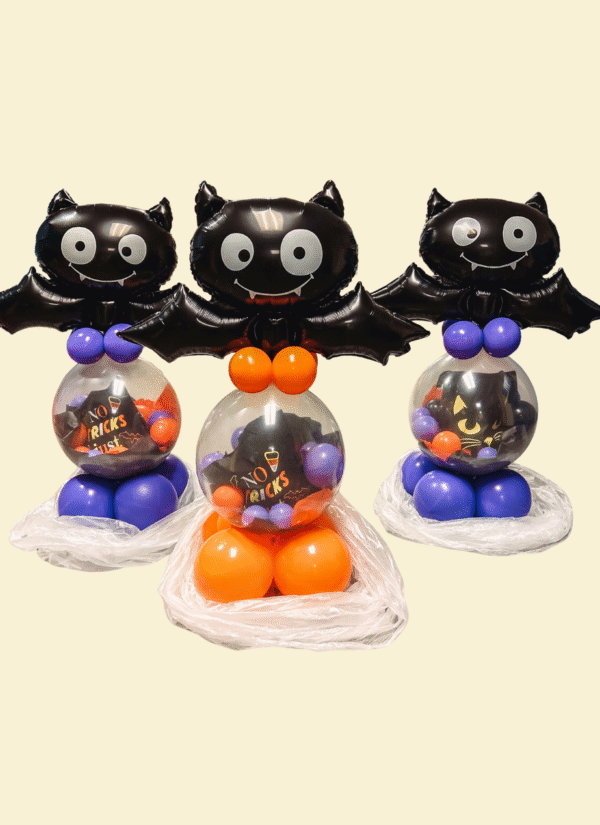 Halloween stuffed balloon gift with chips, drink, and full-size candy by Legacy Balloons Tacoma.
